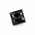 Single square-cut black diamond on a clean pure white background
