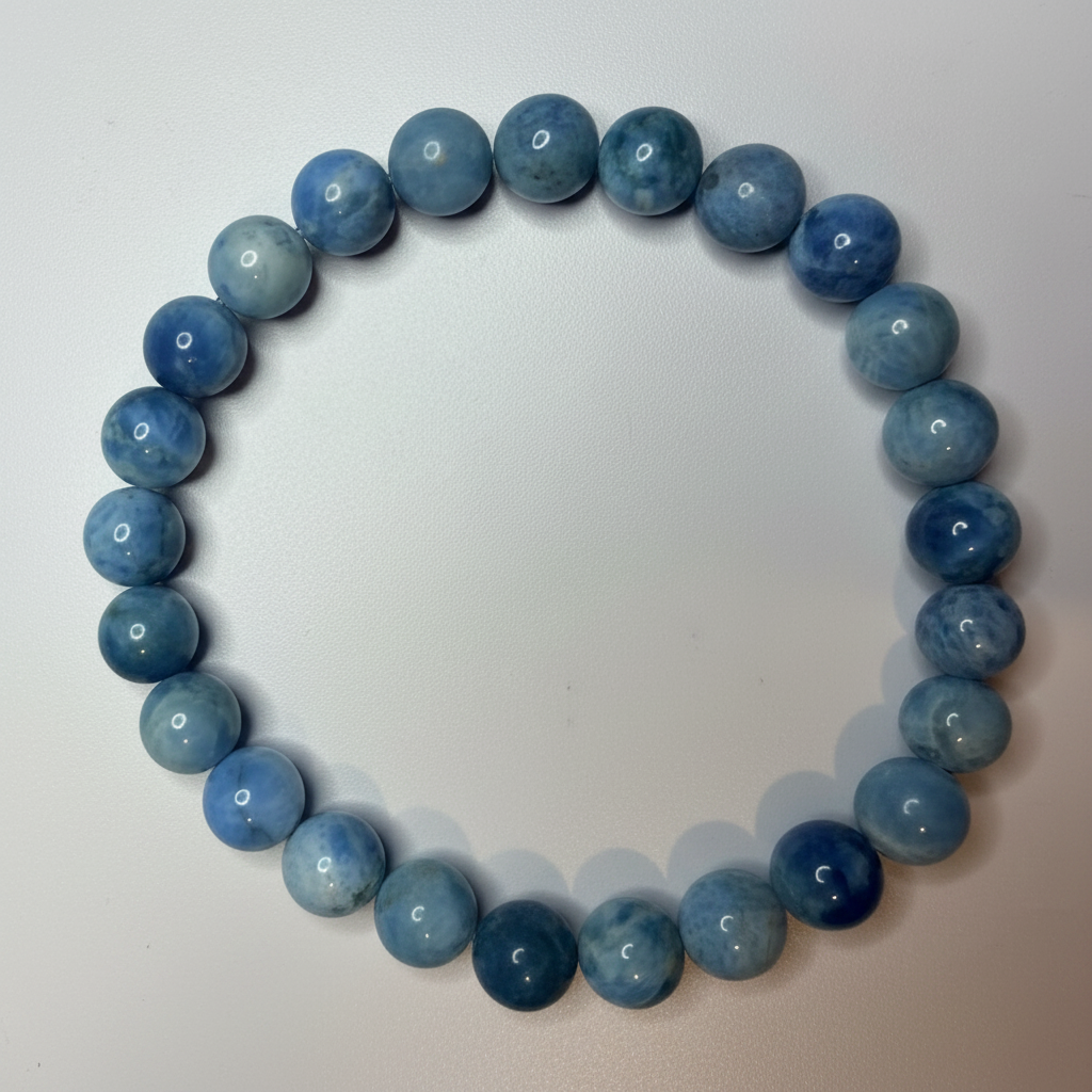 Sky Blue Larimar beaded bracelet 8mm beads overhead view