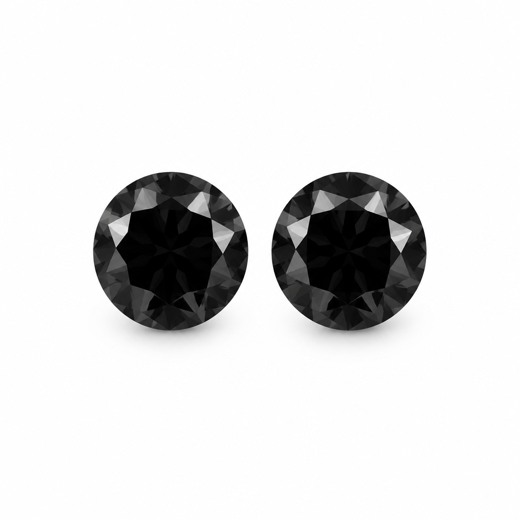 Pair of two matching loose round black diamonds, 3mm each, on a clean white background