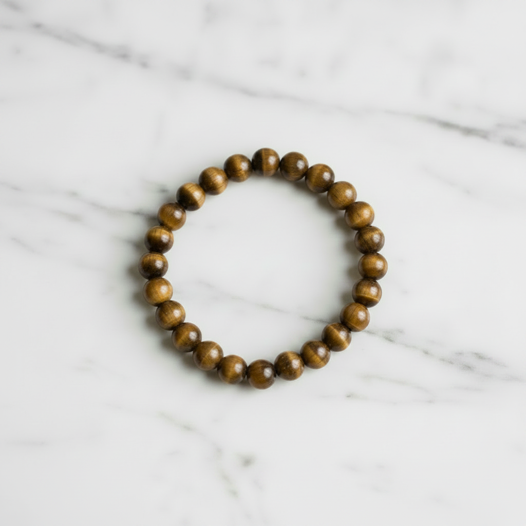 Tiger's Eye beaded bracelet 6.5mm beads on elastic cord, overhead flat lay