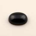 Polished 16x12mm oval black onyx cabochon gemstone