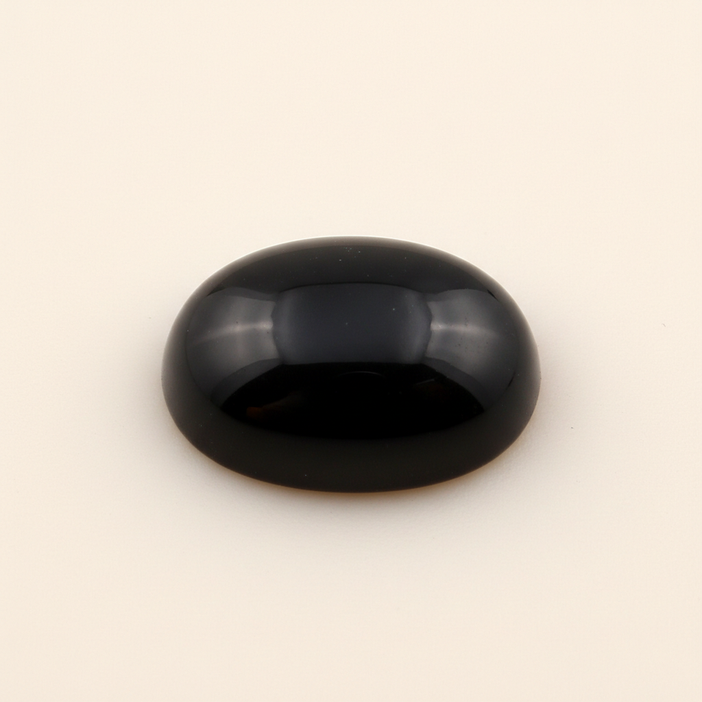 Polished 16x12mm oval black onyx cabochon gemstone