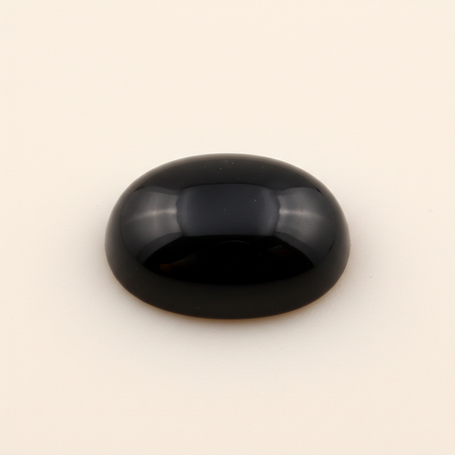 Polished 16x12mm oval black onyx cabochon gemstone