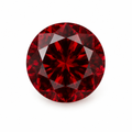 Pyrope garnet round cut 5mm on a white background