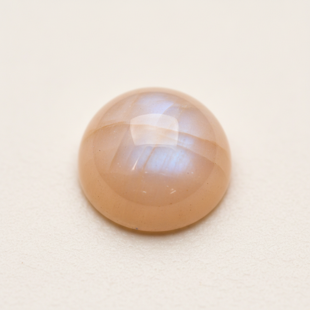 Round peach moonstone cabochon